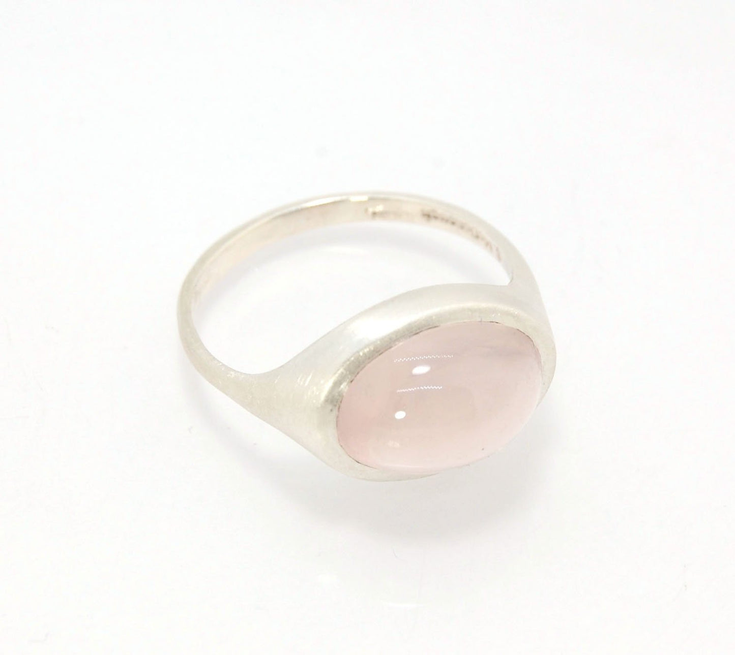 Rose Quartz Ring in Brushed Silver This is one of my first wax carved designs cast in sterling silver using a lost wax process. I start with a piece of wax and math and start carving until the ring is revealed! The back of the rIng is fully open so the ro