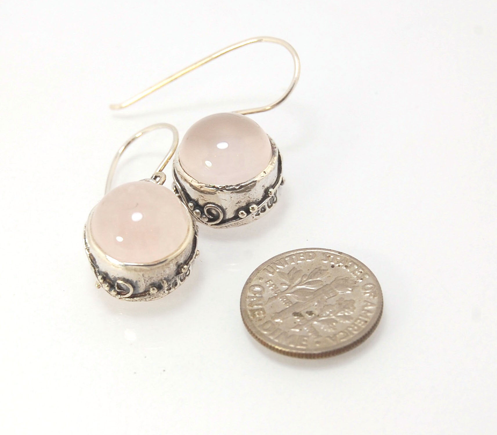 Round Rose Quartz Swirled Earrings in Sterling - - Large 15mm These are cast in my studio using the ancient technique of lost wax casting with a wax model molded from an original granulated piece of fine silver. These rose quartz cabochon earrings have a