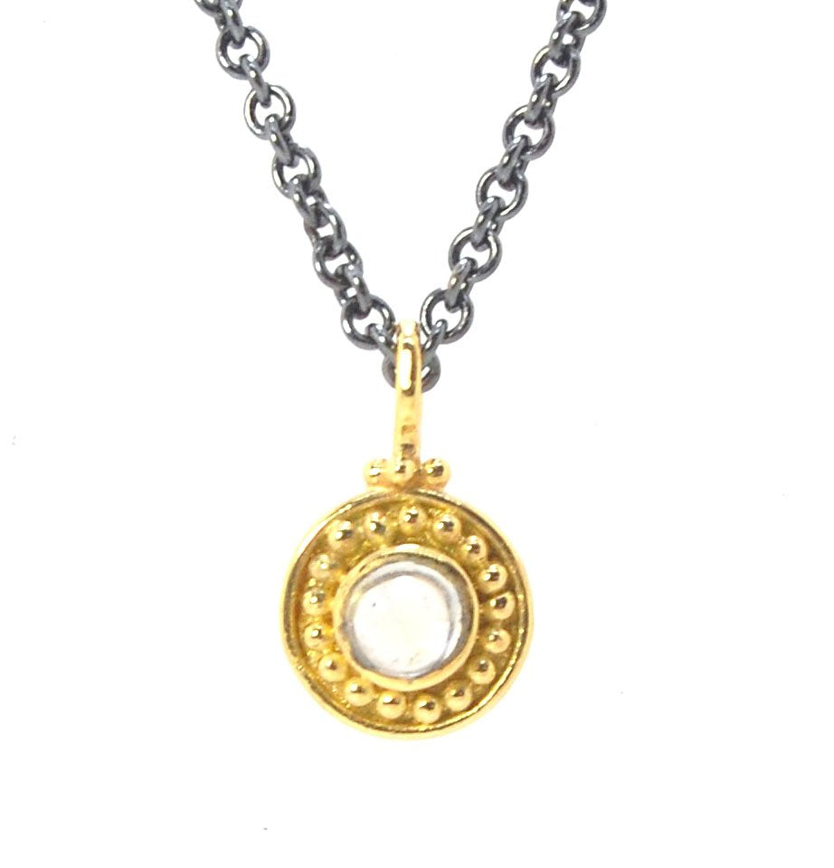 Tiny Round Rainbow Moonstone 18k gold Granulated Pendant This beautiful tiny round rainbow moonstone has so much luminance! A bezel-set small round rainbow moonstone is surrounded by larger 18k gold granules and can be ordered on the your chain of choice.