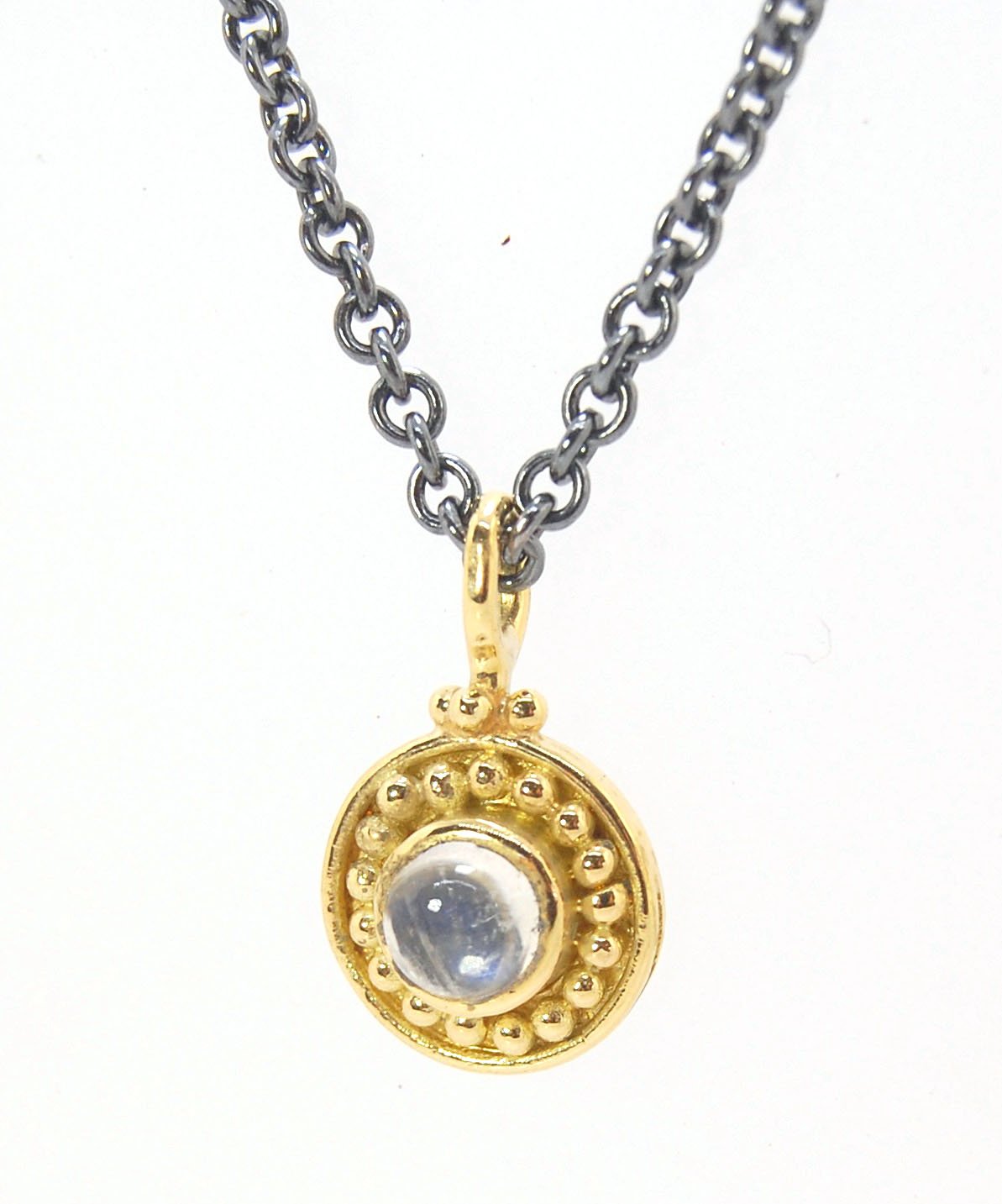 Tiny Round Rainbow Moonstone 18k gold Granulated Pendant This beautiful tiny round rainbow moonstone has so much luminance! A bezel-set small round rainbow moonstone is surrounded by larger 18k gold granules and can be ordered on the your chain of choice.