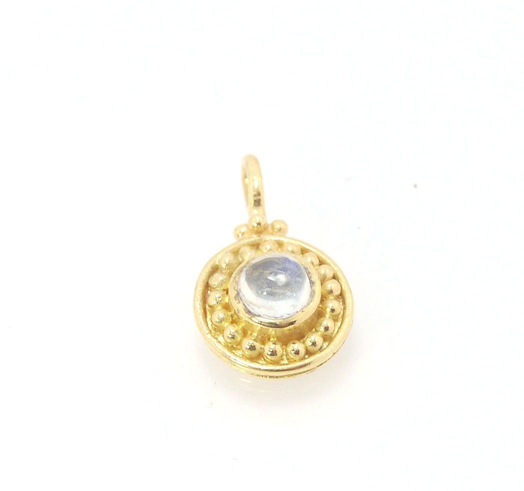 Tiny Round Rainbow Moonstone 18k gold Granulated Pendant This beautiful tiny round rainbow moonstone has so much luminance! A bezel-set small round rainbow moonstone is surrounded by larger 18k gold granules and can be ordered on the your chain of choice.