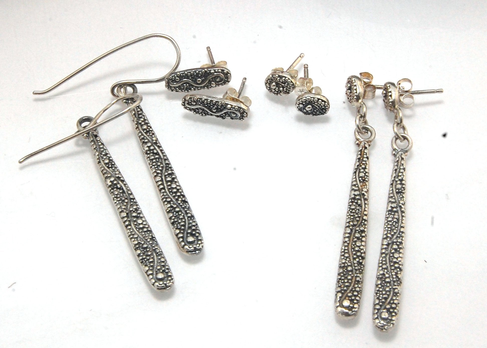 Seaweed Dangles - Long Earrings These seaweed dangle have terrific movement and sparkle. These are cast versions of my original granulation work, which is then molded for repeat waxes and cast using the ancient Lost Wax Process. Granulation is an ancient