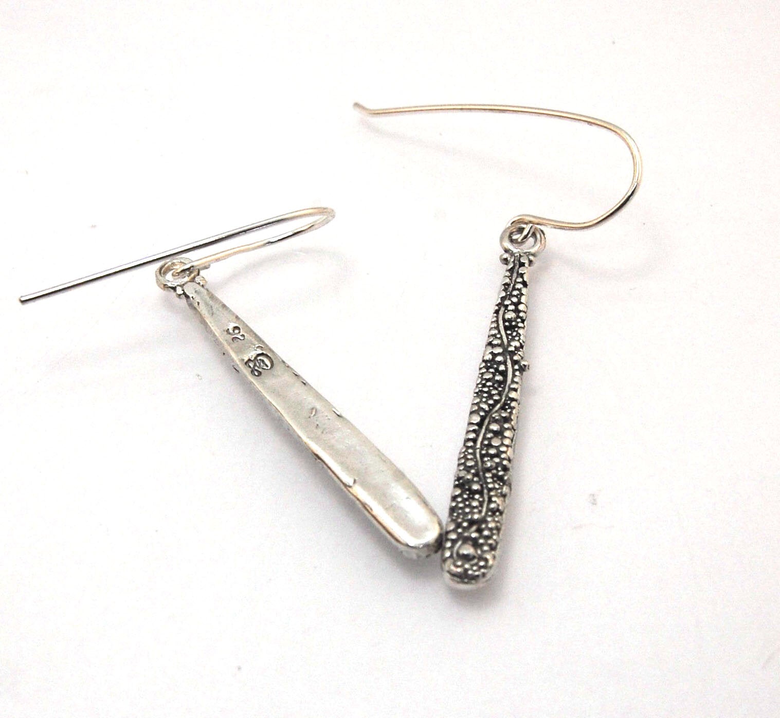 Seaweed Dangles - Long Earrings These seaweed dangle have terrific movement and sparkle. These are cast versions of my original granulation work, which is then molded for repeat waxes and cast using the ancient Lost Wax Process. Granulation is an ancient