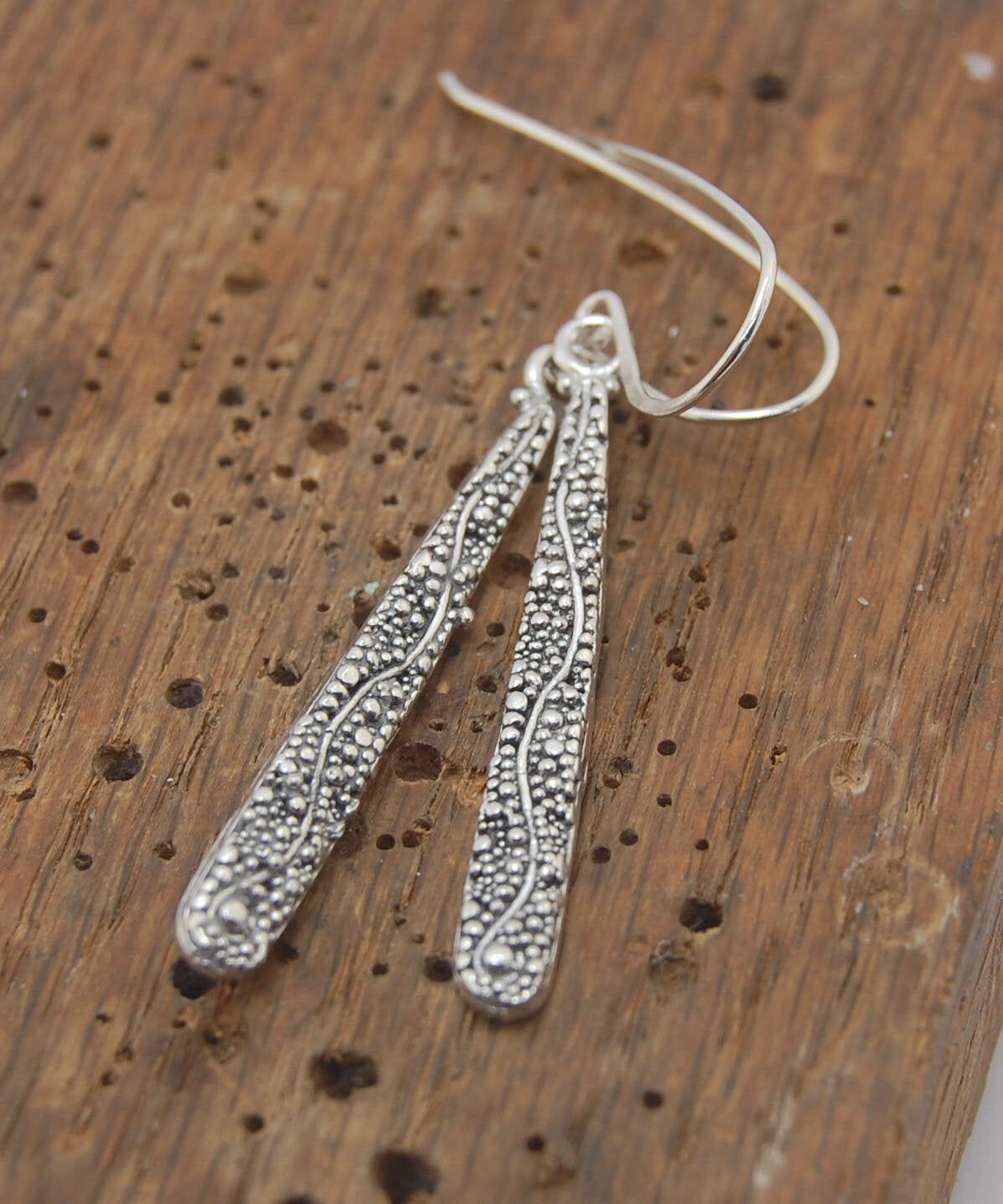 Seaweed Dangles - Long Earrings These seaweed dangle have terrific movement and sparkle. These are cast versions of my original granulation work, which is then molded for repeat waxes and cast using the ancient Lost Wax Process. Granulation is an ancient