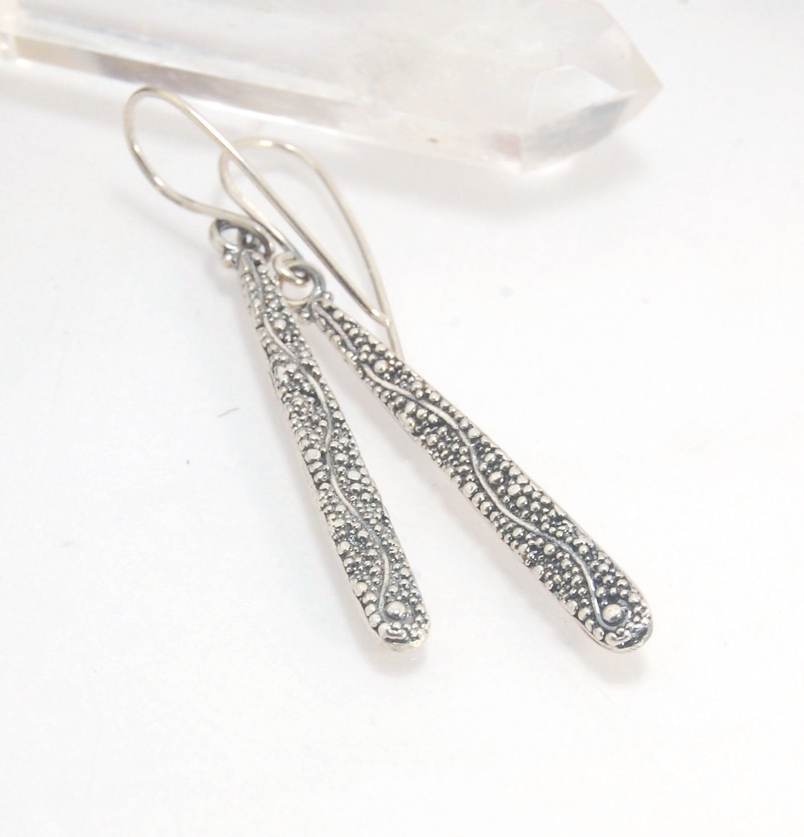 Seaweed Dangles - Long Earrings These seaweed dangle have terrific movement and sparkle. These are cast versions of my original granulation work, which is then molded for repeat waxes and cast using the ancient Lost Wax Process. Granulation is an ancient