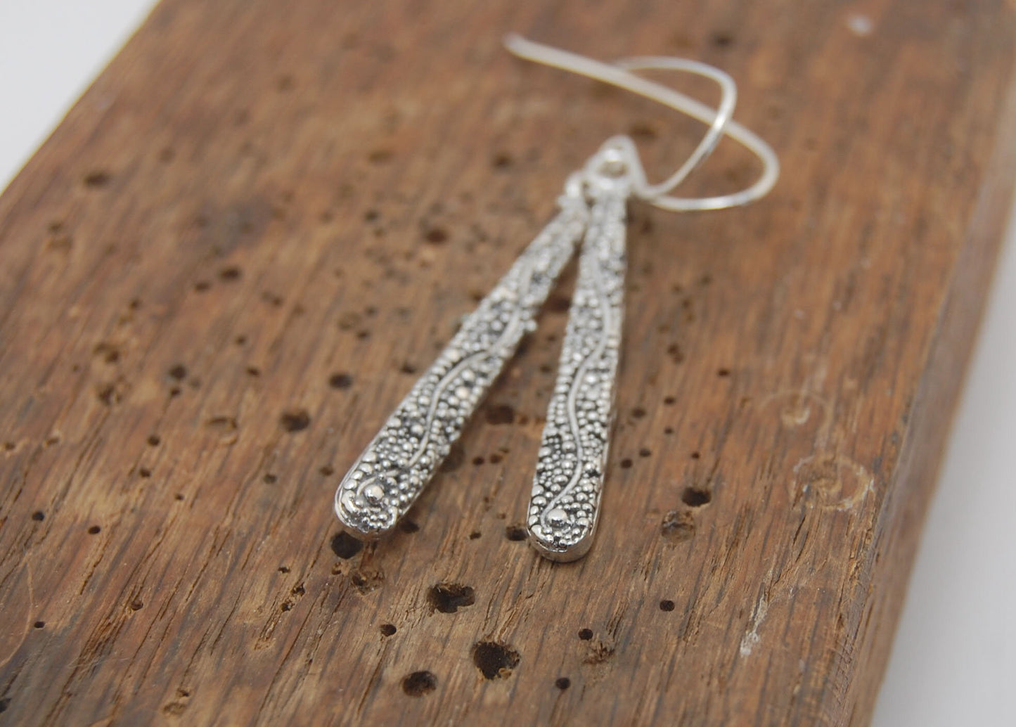 Seaweed Dangles - Long Earrings These seaweed dangle have terrific movement and sparkle. These are cast versions of my original granulation work, which is then molded for repeat waxes and cast using the ancient Lost Wax Process. Granulation is an ancient