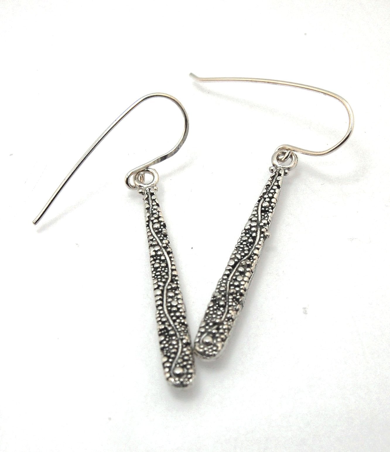 Seaweed Dangles - Long Earrings These seaweed dangle have terrific movement and sparkle. These are cast versions of my original granulation work, which is then molded for repeat waxes and cast using the ancient Lost Wax Process. Granulation is an ancient