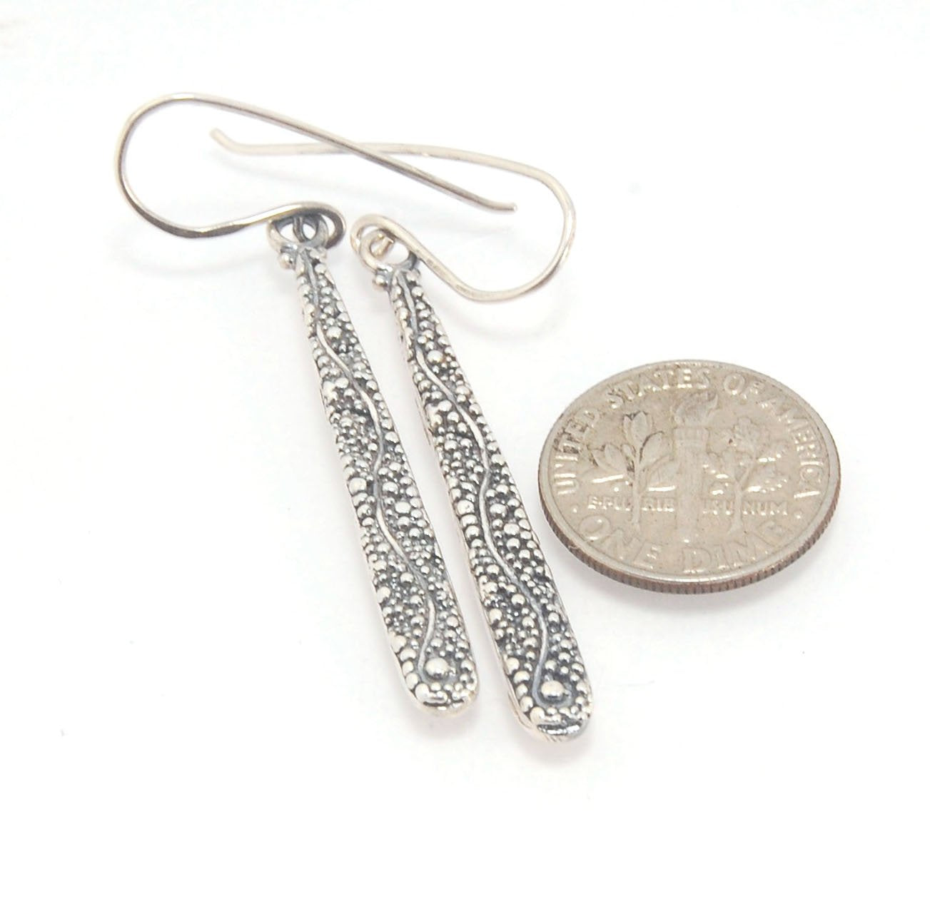 Seaweed Dangles - Long Earrings These seaweed dangle have terrific movement and sparkle. These are cast versions of my original granulation work, which is then molded for repeat waxes and cast using the ancient Lost Wax Process. Granulation is an ancient