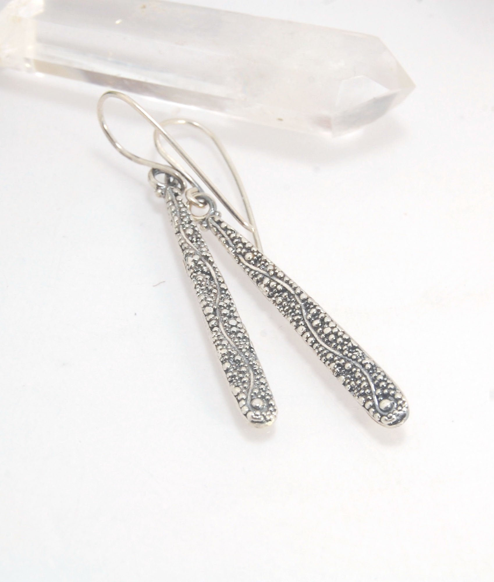 Seaweed Dangles - Long Earrings These seaweed dangle have terrific movement and sparkle. These are cast versions of my original granulation work, which is then molded for repeat waxes and cast using the ancient Lost Wax Process. Granulation is an ancient