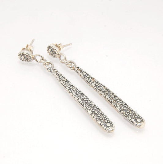 Seaweed Long Dangle Post Earrings These seaweed Post dangle earrings are cast versions of my original granulation work. Once the original work is made using the ancient technique of granulation, it is then molded for repeat waxes and then cast using the L