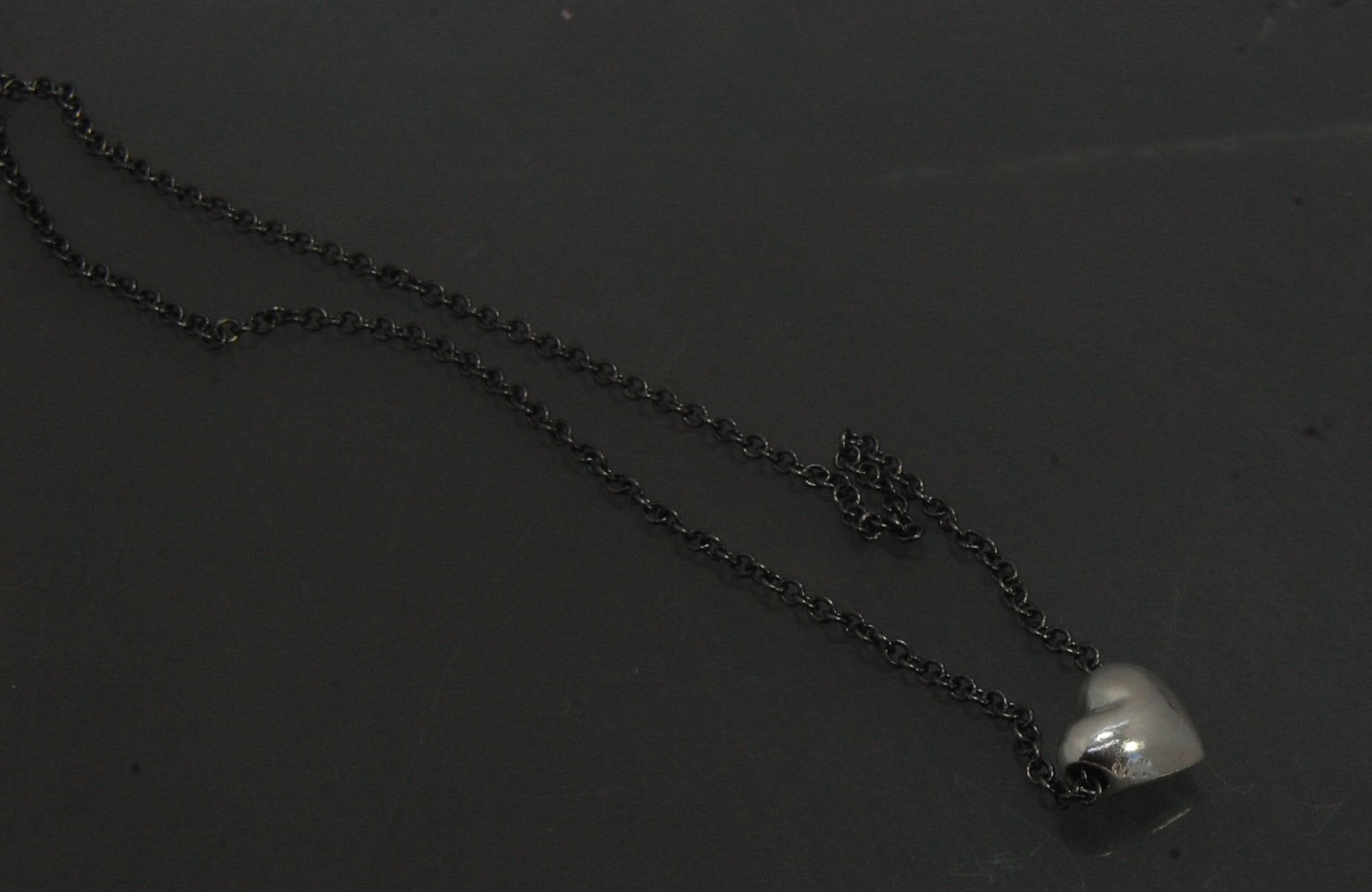 OMG Puffy Heart Slider Pendant in Sterling Silver OMG! This puffy heart pendant is super cute! I carved this little guy in wax and have been casting them all week!A drilled-out solid puffy heart cast in solid sterling silver and drilled to accommodate a 1