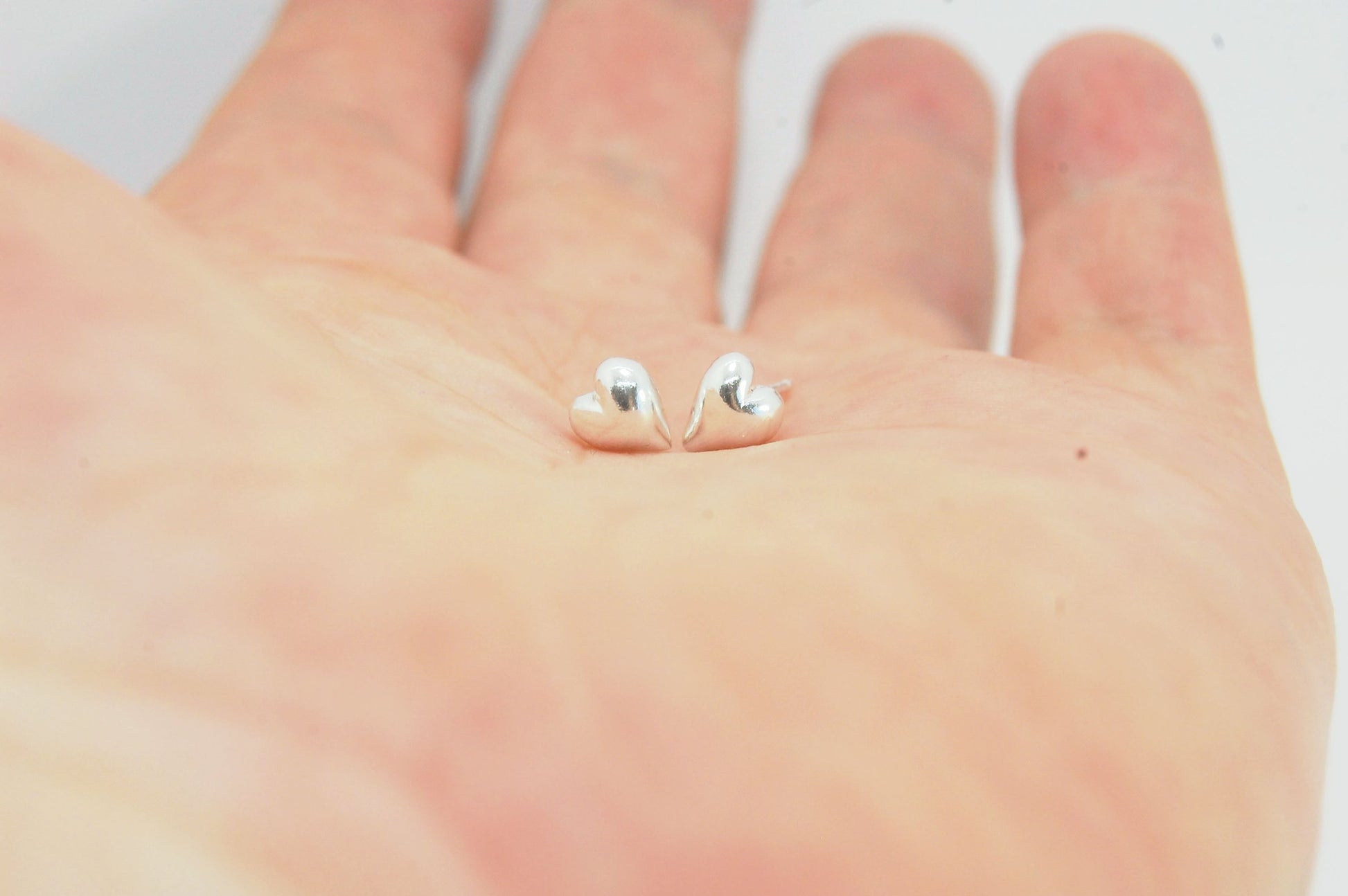 OMG Puffy Heart Post Earrings in 14k Gold or Sterling Silver OMG! These puffy heart earrings are so sweet! I carved this little guy in wax and have been casting them all week in both silver and gold.Choose a pair of tiny solid puffy hearts cast in 14k gol