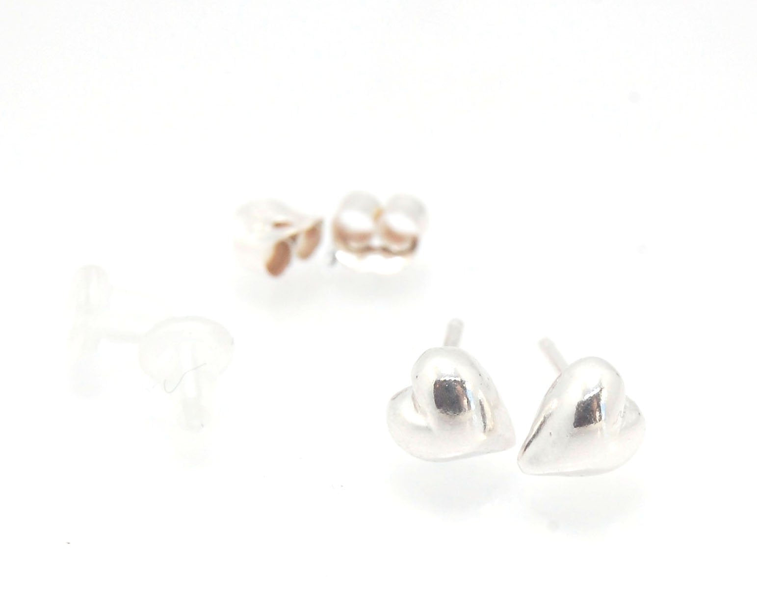 OMG Puffy Heart Post Earrings in 14k Gold or Sterling Silver OMG! These puffy heart earrings are so sweet! I carved this little guy in wax and have been casting them all week in both silver and gold.Choose a pair of tiny solid puffy hearts cast in 14k gol