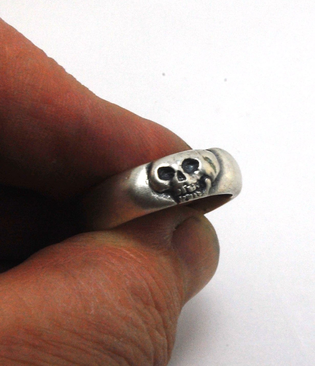 Memento Mori Skull Ring - Wide This is the widest of my Memento Mori skull rings at 7mm. Cast in sterling silver and given a brushed finish after oxidizing the recesses of the skull. Heavyweight, very comfortable.SterlingI made these Memento Mori rings fo