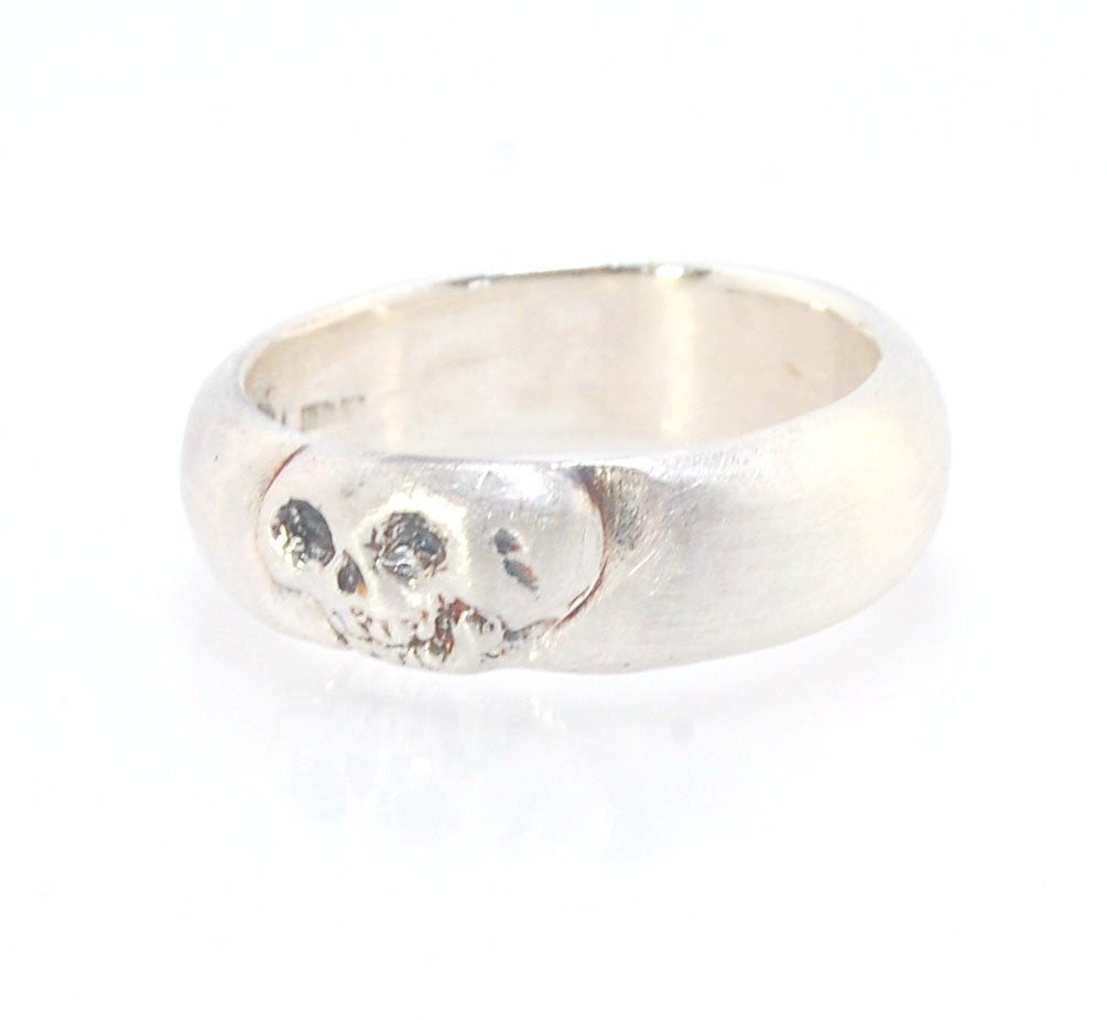 Memento Mori Skull Ring - Wide This is the widest of my Memento Mori skull rings at 7mm. Cast in sterling silver and given a brushed finish after oxidizing the recesses of the skull. Heavyweight, very comfortable.SterlingI made these Memento Mori rings fo