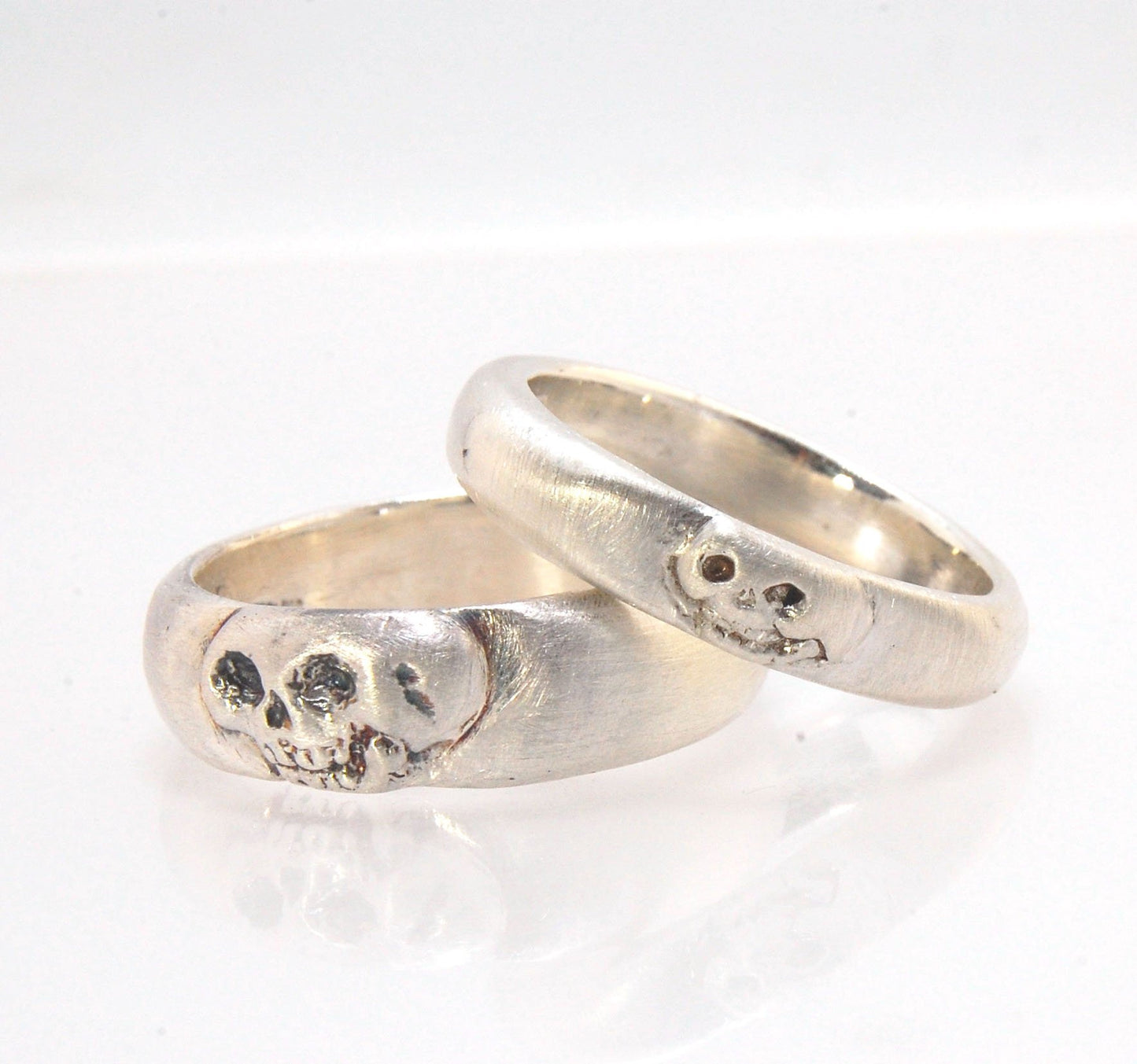 Memento Mori Skull Ring - Wide This is the widest of my Memento Mori skull rings at 7mm. Cast in sterling silver and given a brushed finish after oxidizing the recesses of the skull. Heavyweight, very comfortable.SterlingI made these Memento Mori rings fo