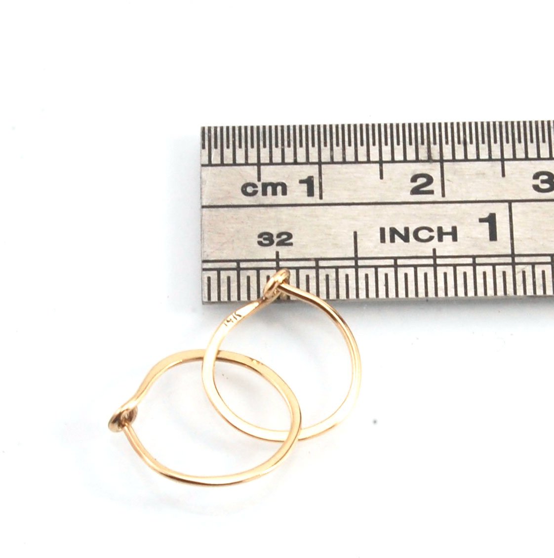 Hammered 14k Hoops - Small, Medium and Large These are exactly the same as my hammered sterling hoops, but they are made of solid 14k gold! They are super lightweight, classic wire hammered hoops you can sleep and live in. These delicate hoops are forged