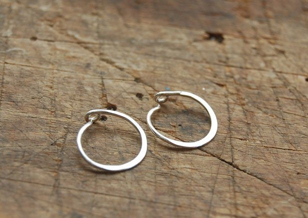 Hammered Hoops - Sterling - Small, Medium and Large Looking for an affordable handmade gift? Or some super lightweight Sterling Silver Hoops you can live in? These classic wire hammered hoops you can sleep and live in are forged from 20 gage Sterling wire