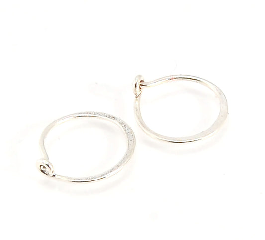 Hammered Hoops - Sterling - Small, Medium and Large Looking for an affordable handmade gift? Or some super lightweight Sterling Silver Hoops you can live in? These classic wire hammered hoops you can sleep and live in are forged from 20 gage Sterling wire