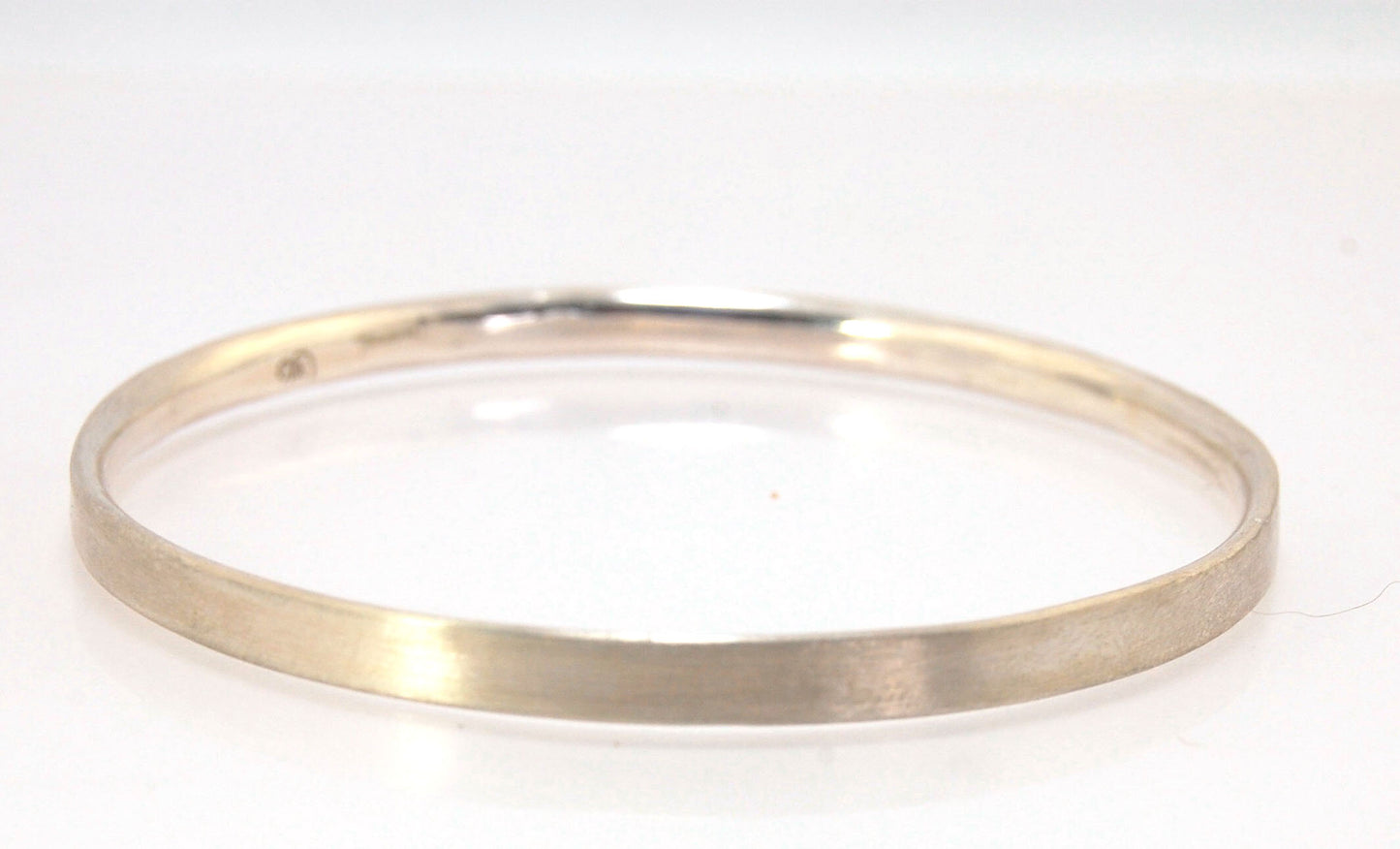 5mm Inverted Half Round Sterling Silver Bangles Who doesn’t love a good bangle stack! These comfortable inverted half round bangles are available in 2 finishes. Shiny or Matte.Handmade by me in my studio, I pour a large ingot of sterling silver and roll i