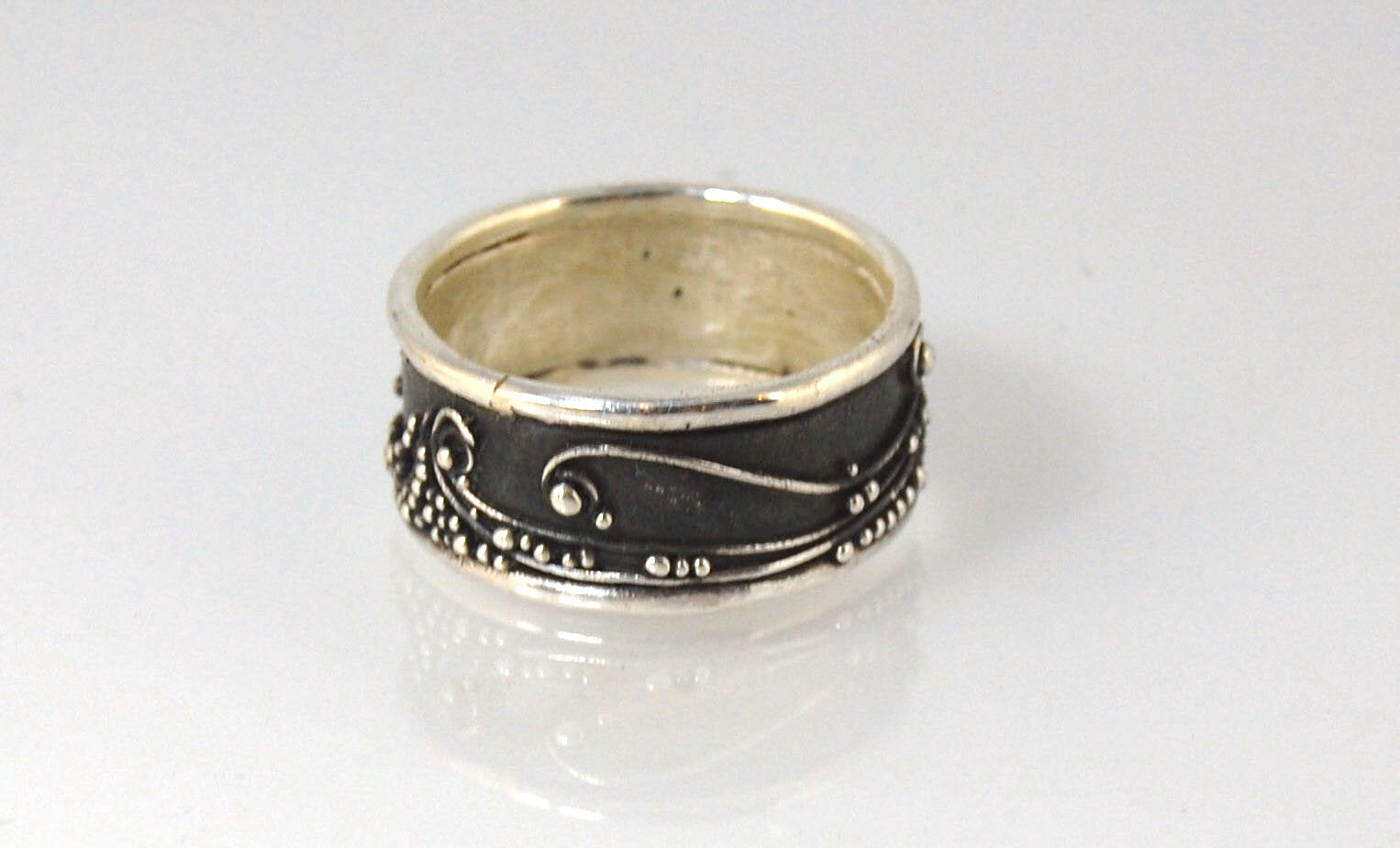 Waves Fine Silver Granulation Ring 11mm wide - PBS RING This is very similar to the ring I made during the segment of “A Craftsman’s Legacy” on PBS a few years ago. I am happy to make one for you in your size.Granulation is an ancient fusing process utili