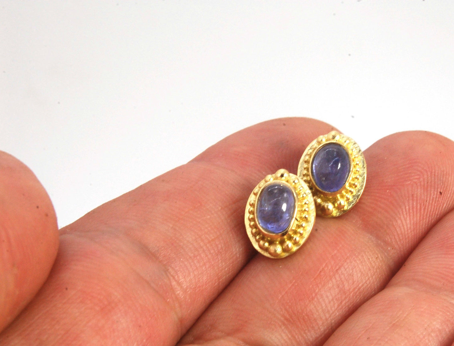 Tanzanite Oval Cabochon 18k Gold Granulated Post Earrings with 14k gold ear nuts I double love this color combination! These luminous, translucent tanzanites look terrific with the juicy 18k gold, especially with this finish. Tanzanite oval cabochons are