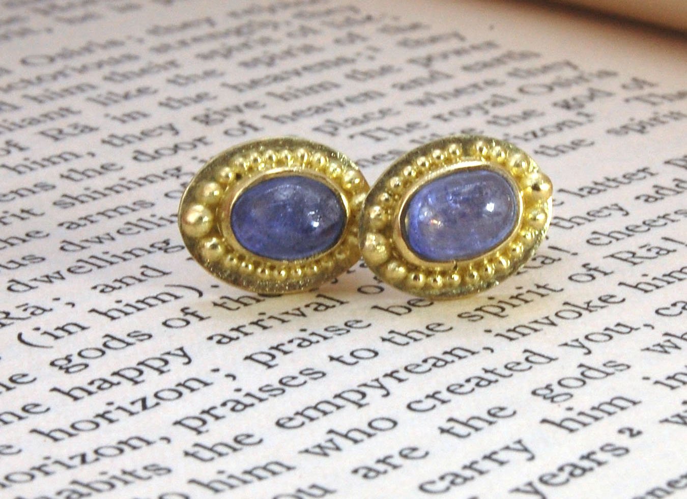 Tanzanite Oval Cabochon 18k Gold Granulated Post Earrings with 14k gold ear nuts I double love this color combination! These luminous, translucent tanzanites look terrific with the juicy 18k gold, especially with this finish. Tanzanite oval cabochons are