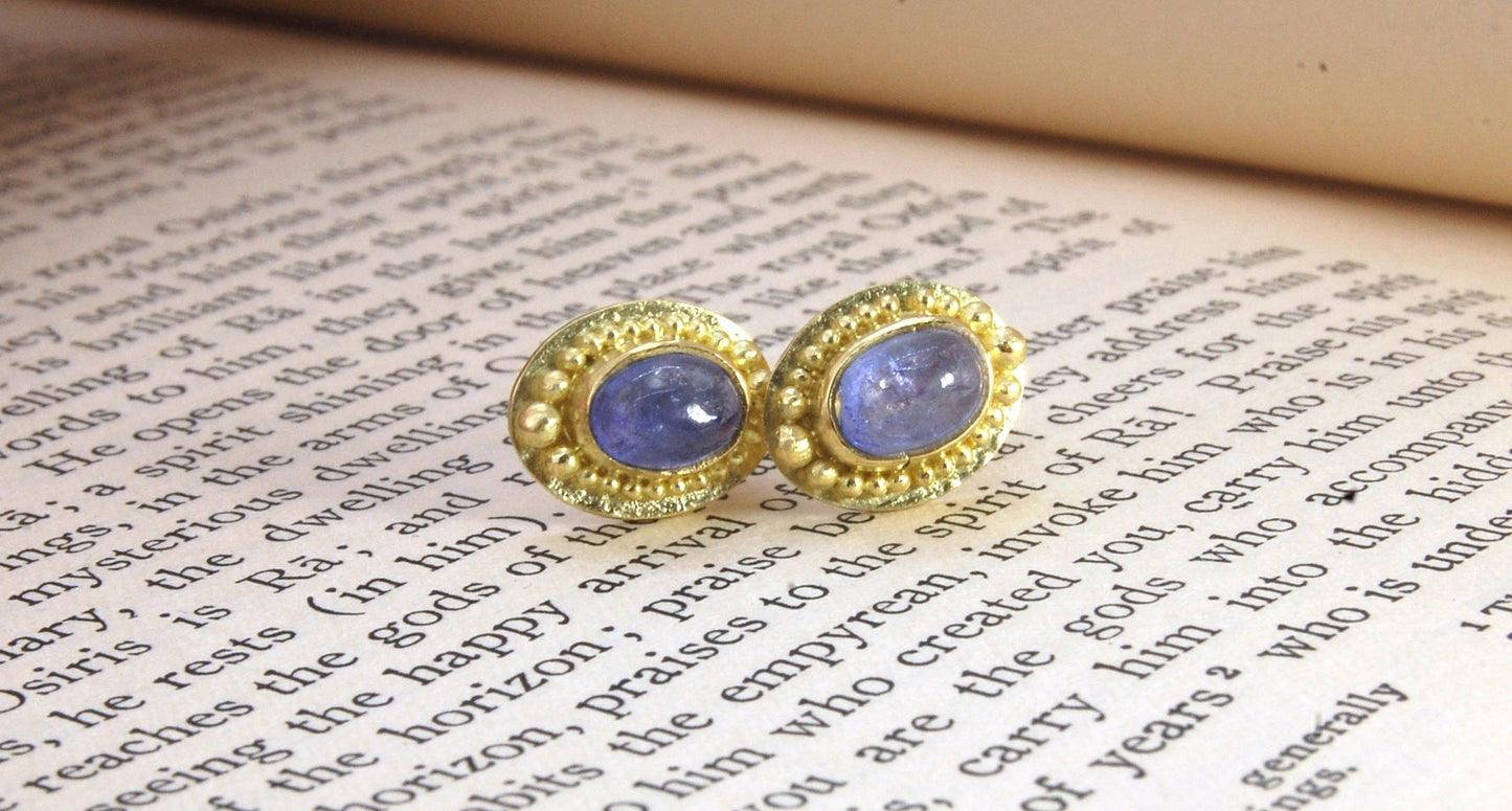 Tanzanite Oval Cabochon 18k Gold Granulated Post Earrings with 14k gold ear nuts I double love this color combination! These luminous, translucent tanzanites look terrific with the juicy 18k gold, especially with this finish. Tanzanite oval cabochons are