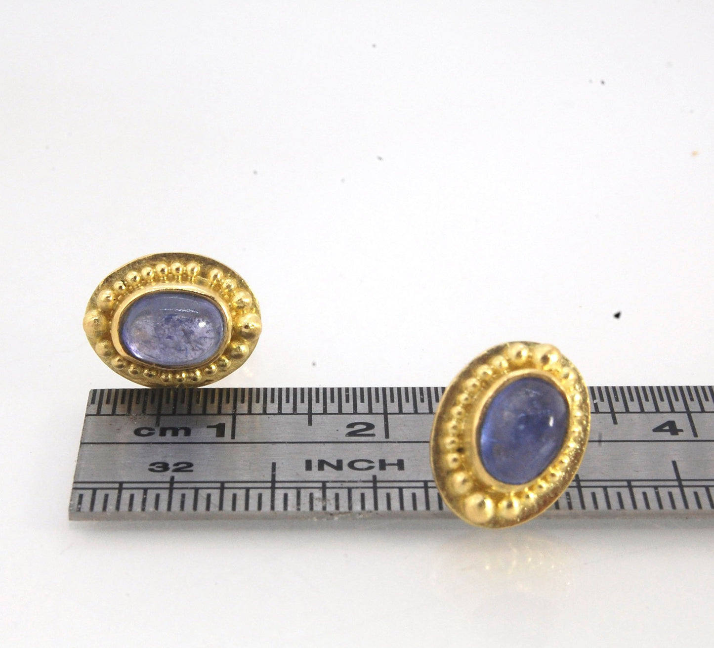 Tanzanite Oval Cabochon 18k Gold Granulated Post Earrings with 14k gold ear nuts I double love this color combination! These luminous, translucent tanzanites look terrific with the juicy 18k gold, especially with this finish. Tanzanite oval cabochons are