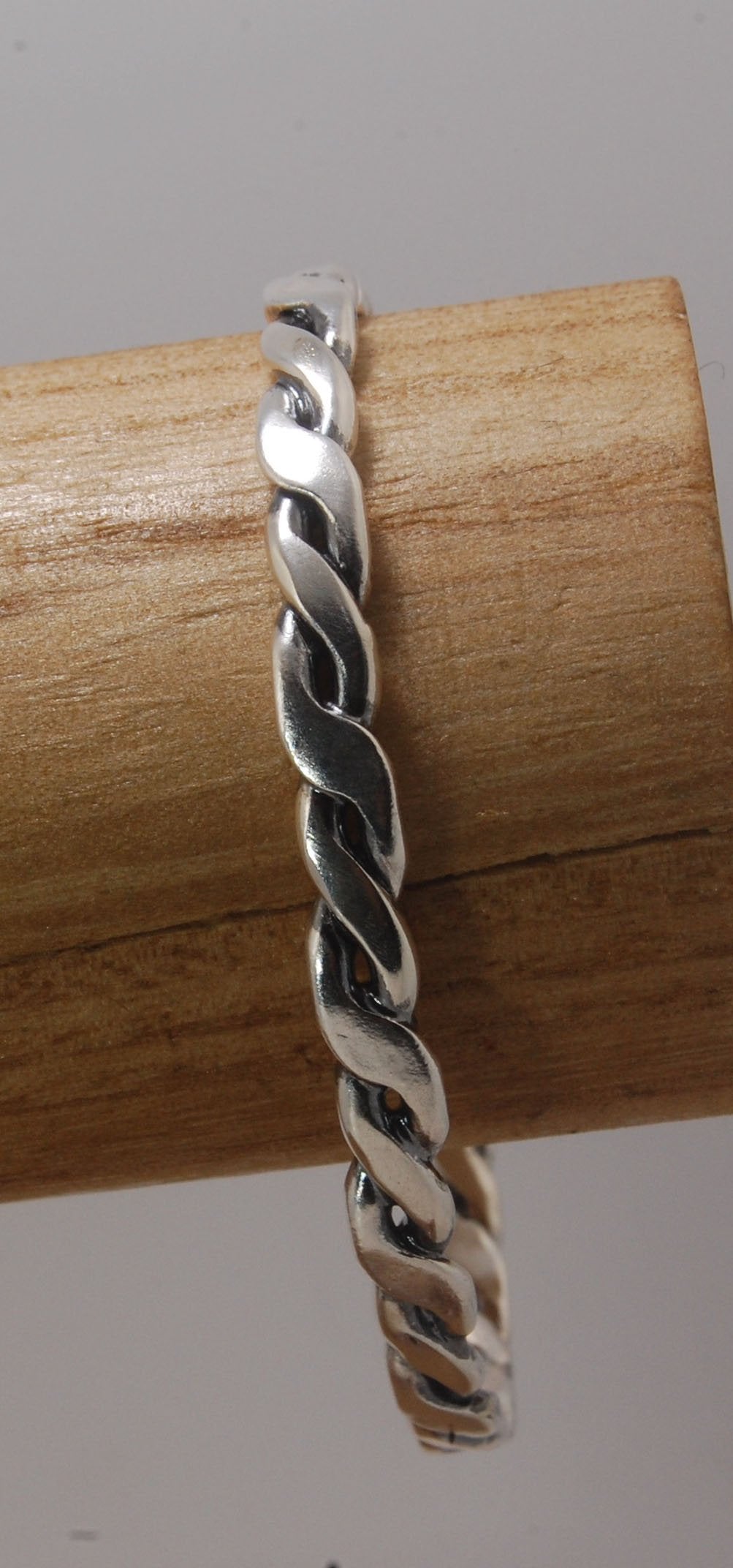 Twisted Cuff Bracelet - Sterling Silver This is a heavy, solid, twisted sterling silver cuff with a brushed finish. A staple of any collection! This sterling silver twisted cuff bracelet has a nice weight and feels good on. First I pour an ingot of sterli