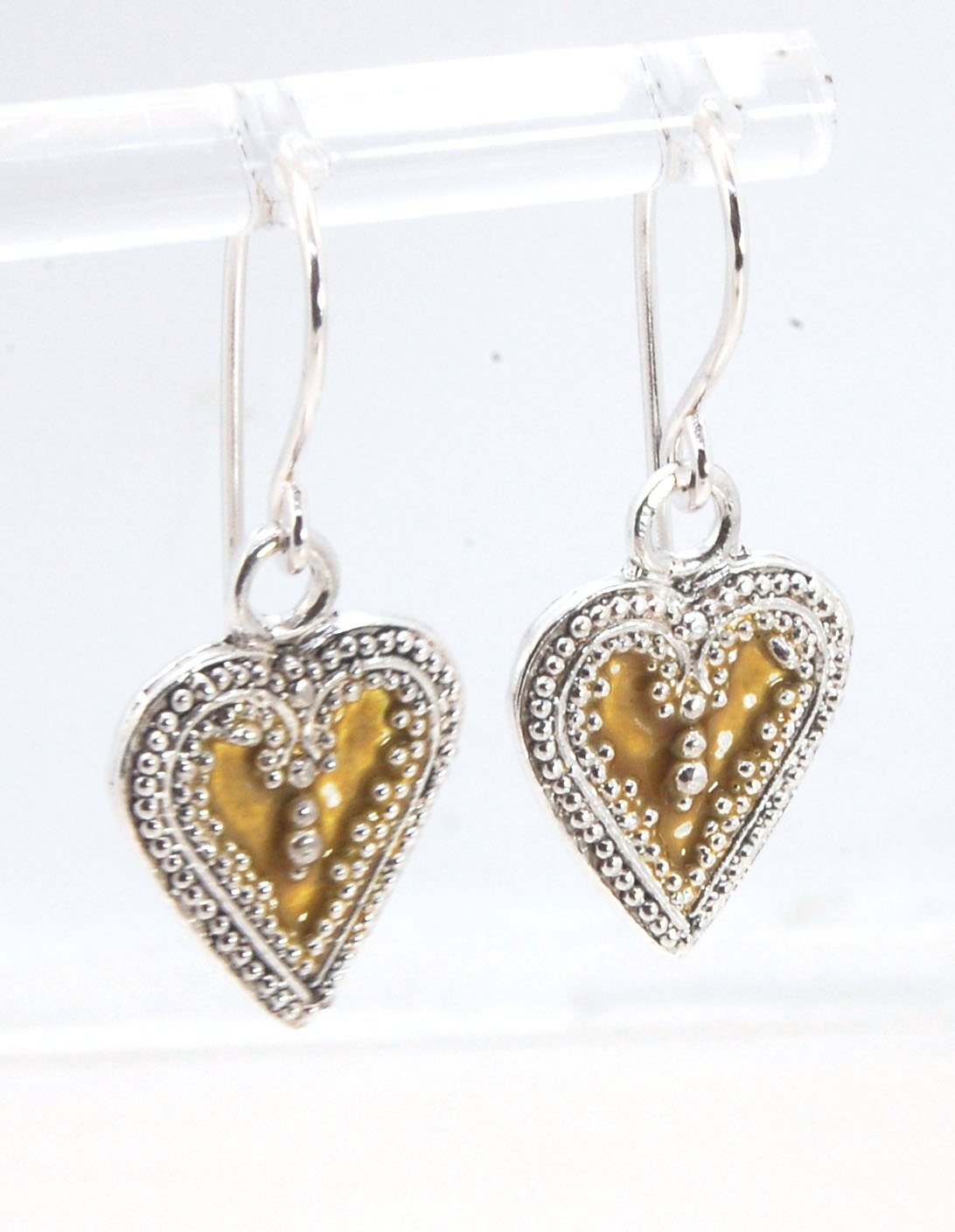 Victorian Hearts Dangle Earrings with Vitreous Enamel It’s VICTORIAN HEART charm dangle earrings in candy colors! Choose from : Red, Hollyhock, Azelea, or MauveThis is a lovely Victorian heart charm in sterling silver with vitreous enamel melted into the