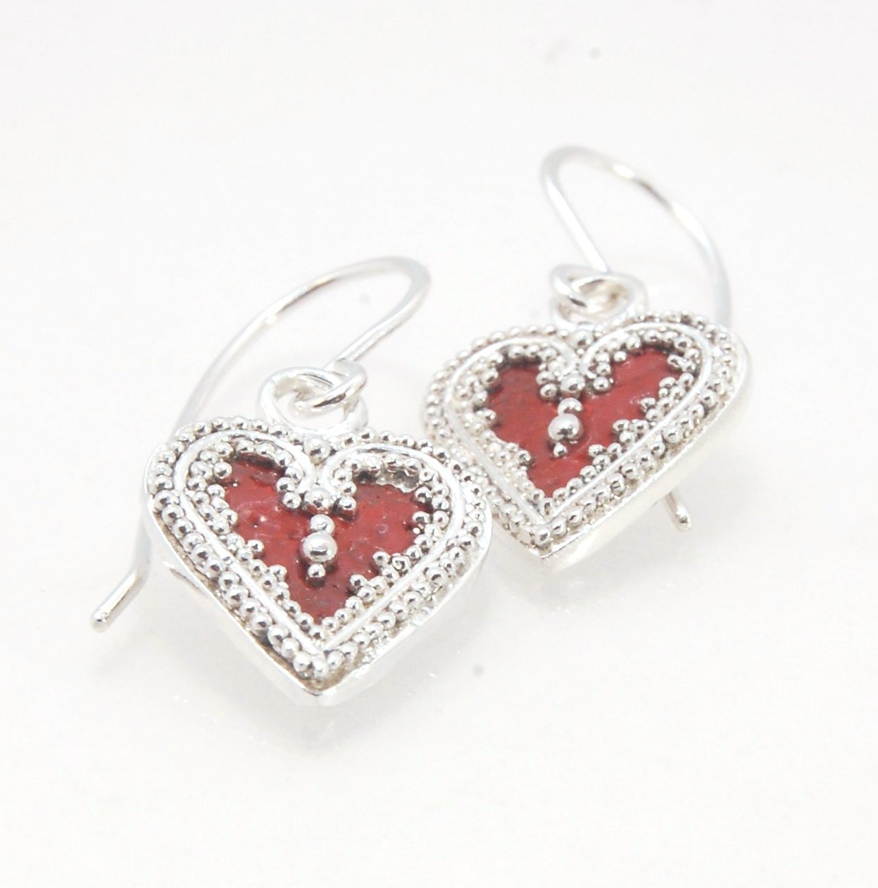 Victorian Hearts Dangle Earrings with Vitreous Enamel It’s VICTORIAN HEART charm dangle earrings in candy colors! Choose from : Red, Hollyhock, Azelea, or MauveThis is a lovely Victorian heart charm in sterling silver with vitreous enamel melted into the