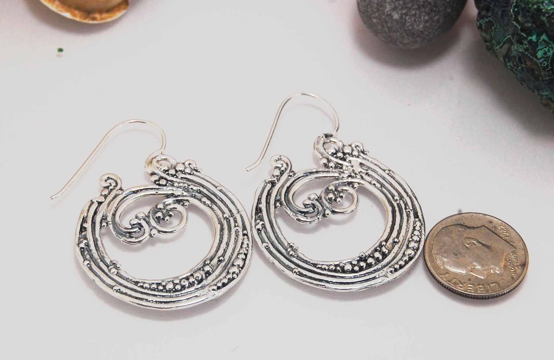 Wave Hoops - Sterling - Large These great Wave Hoops are the Largest of three Waves Hoops. These beauties are cast versions of original fine silver granulation work, which is then molded for repeat waxes and then cast in my studio. Granulation is an ancie