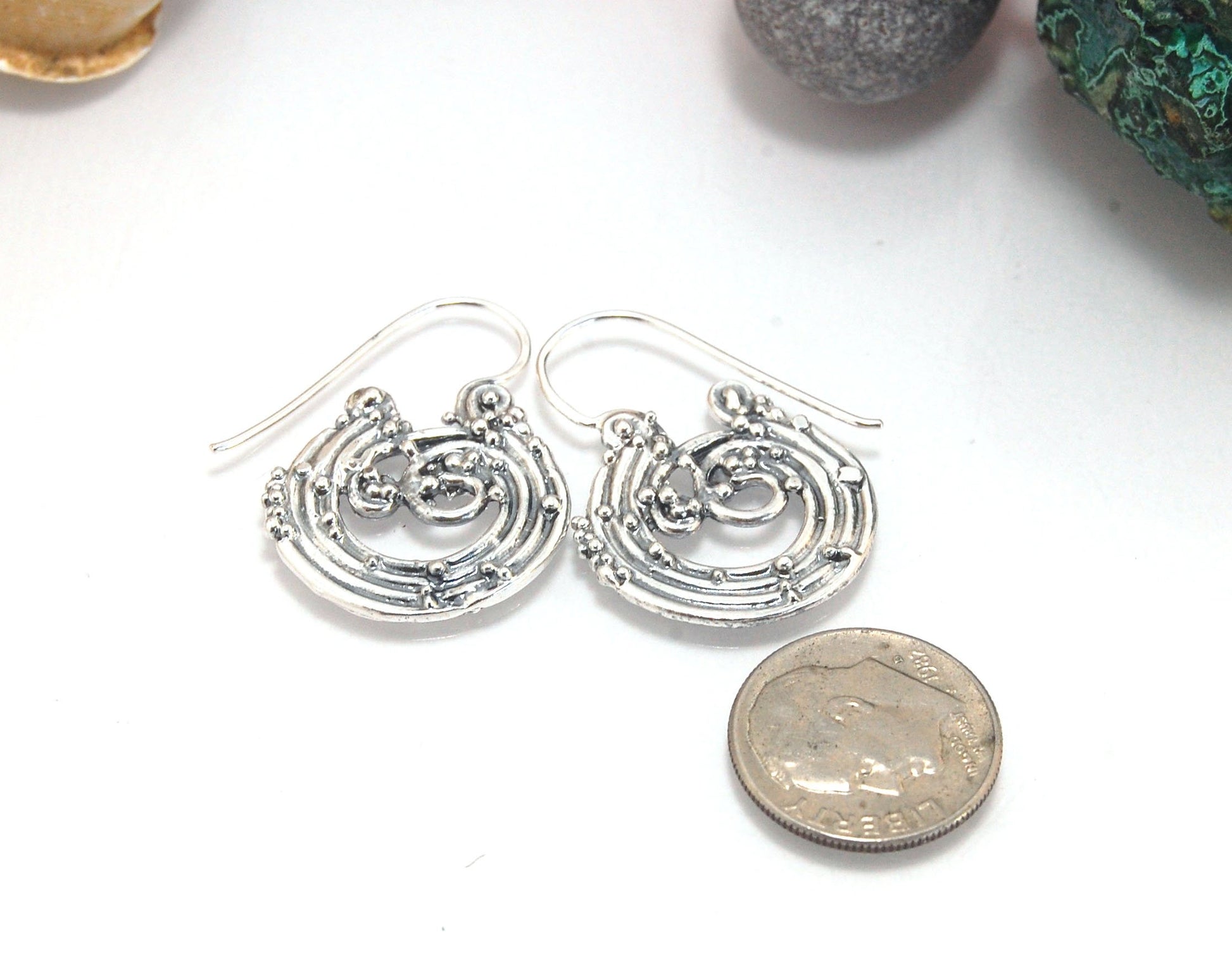 Wave Hoops - Sterling - Medium These Medium Wave Hoops are part of The Minoan Collection. These great Wave Hoops are cast versions of original fine silver granulation work, which is then molded for repeat waxes and then cast in my studio. Granulation is a