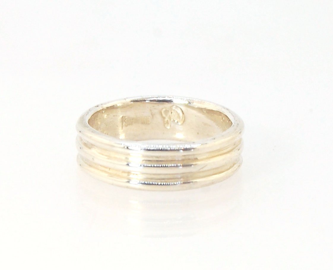 3 Rim Band -6.2mm wide - Sterling silver, 14k or 18k yellow gold This is a 3 rim band cast from a wax carving turned on a lathe and cast using the lost wax process. These are so much fun to make and I have several variations of different rims and widths a