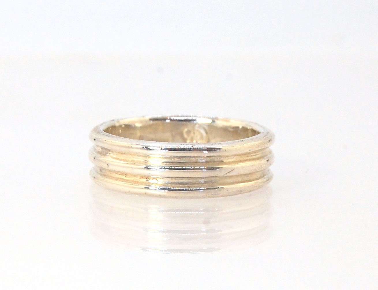 3 Rim Band -6.2mm wide - Sterling silver, 14k or 18k yellow gold This is a 3 rim band cast from a wax carving turned on a lathe and cast using the lost wax process. These are so much fun to make and I have several variations of different rims and widths a