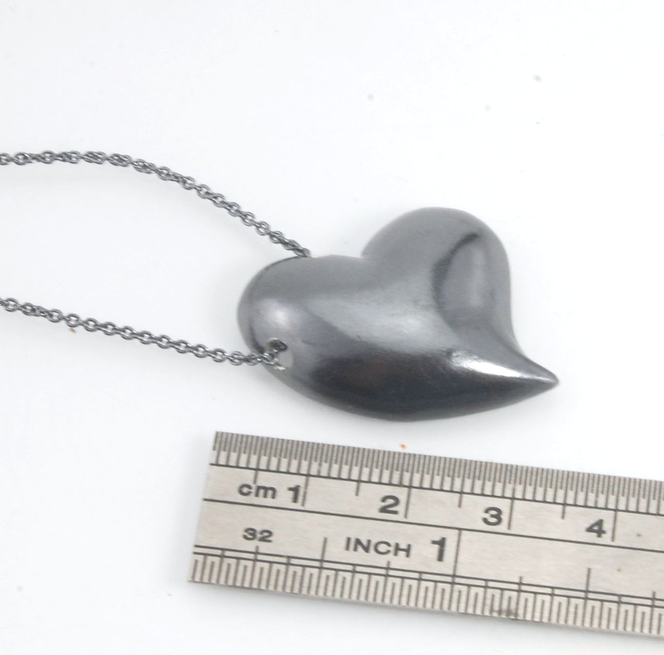 Witch Heart Slider Pendant Necklace This Witch Heart Slider Pendant Necklace in Sterling Silver is a heavy, hollow, silver form I made by wax carving and casting this pendant.The heart shape is called a Witch Heart. Over time, Witch Hearts have symbolized