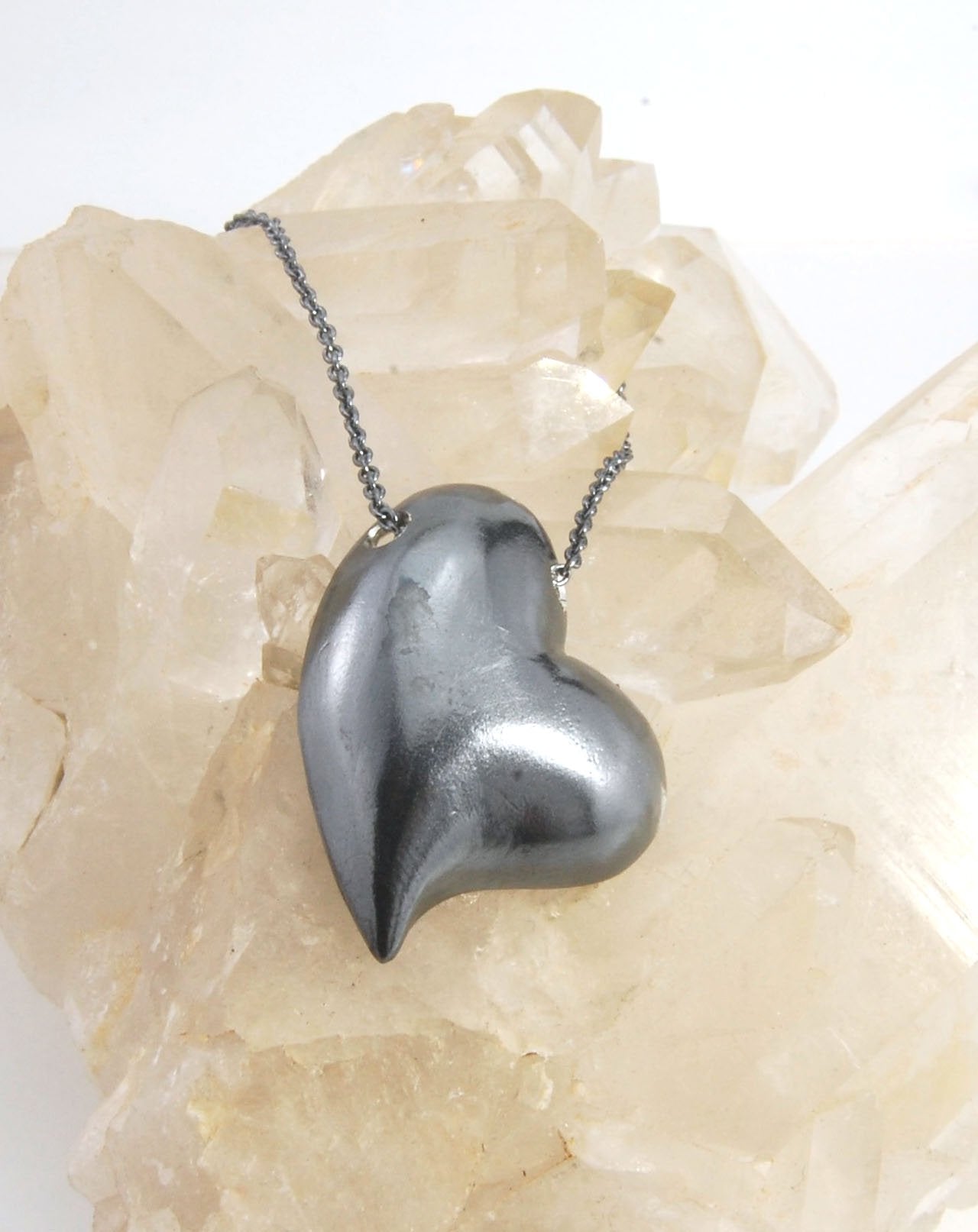 Witch Heart Slider Pendant Necklace This Witch Heart Slider Pendant Necklace in Sterling Silver is a heavy, hollow, silver form I made by wax carving and casting this pendant.The heart shape is called a Witch Heart. Over time, Witch Hearts have symbolized