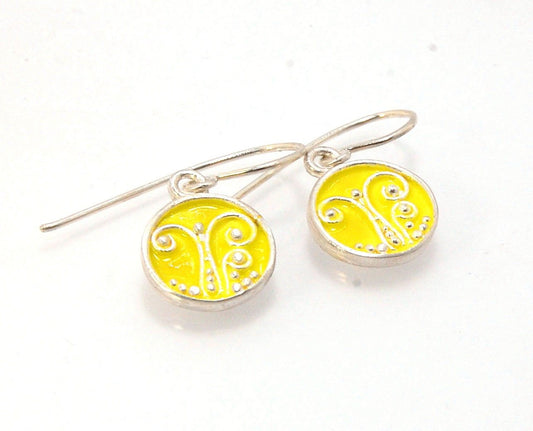 Daffodil Yellow Enameled Sterling Fern Circle Earrings - 12mm cast granulation,Enameled,Enameled earrings,fine silver granulation,silver,Yellow These small silver earrings are enameled in a bright pale yellow! These are cast from a wax mold of a granulate